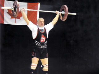 بطل العالم أيمن مظه أكبر أبطال مصر فى رفع الأثقال ر