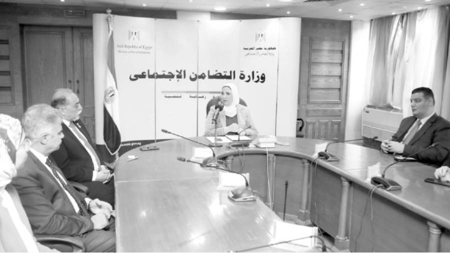 القباج والقصبى بعد توقيع البروتوكول