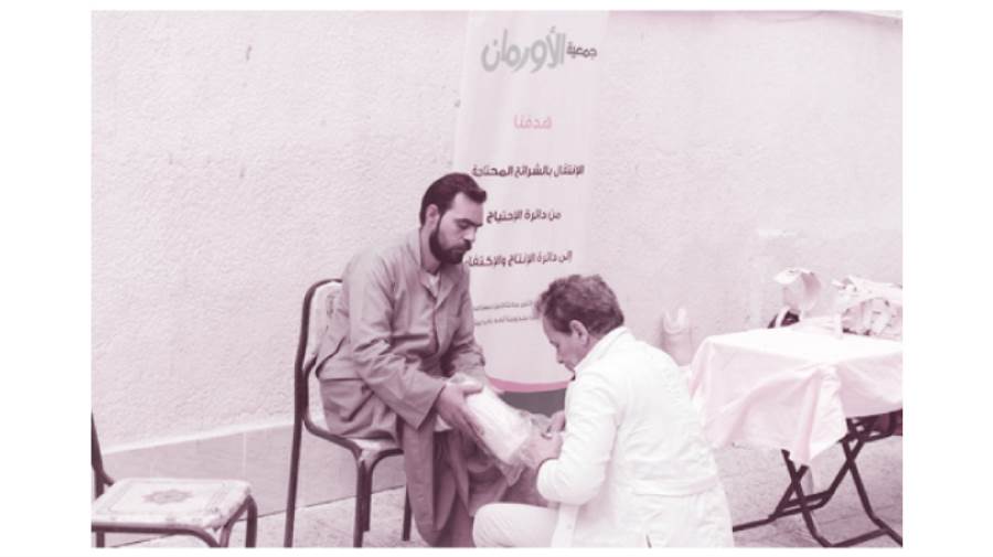 تسليم أجهزة تعويضية للمستحقين