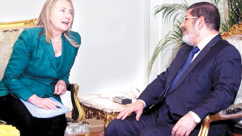 مرسى الجاسوس وهيلارى كلينتون